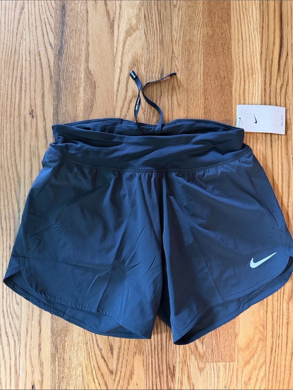 Nike Women’s Black Athletic Shorts with White Swoosh